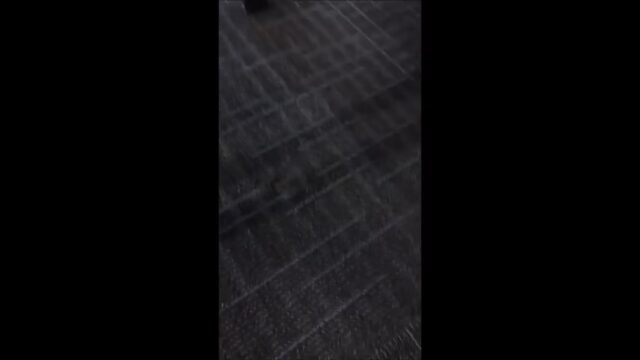 Putting paper under candid toes in sandal